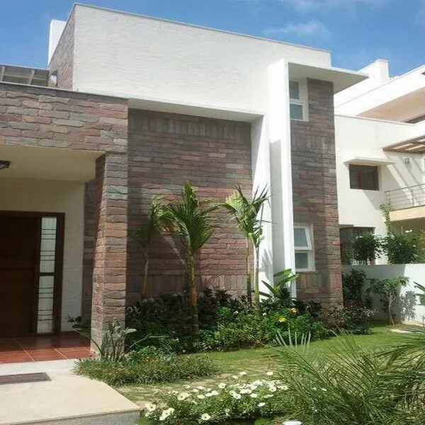 Natural stone elevation design for modern home exteriors in Bangalore